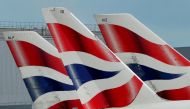 British Airways logos are seen on tailfins at Heathrow Airport in west London, Britain. REUTERS/Toby Melville/Files