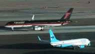 Donald Trump's campaign plane passes Hillary Clinton's campaign plane as it lands in Las Vegas, Nevada. Reuters/Lucy Nicholson