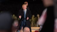 Republican Presidential candidate Donald J. Trump applauds supporters after a rally at the McGrath Amphitheater on October 28, 2016 in Cedar Rapids, Iowa.  David Greedy / AFP
