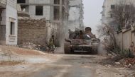 A Syrian opposition group get prepared before they attack the positions of the Assad regime forces with missiles during an operation to break the siege of the regime forces in the city center in Aleppo, Syria on October 28, 2016. ( Ahmed Hasan Obed - Anad