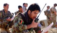 An Afghan Tactical Air Controller practices directing an air strike during an exercise at a range outside Kabul, October 18, 2016. (REUTERS / Josh Smith) 