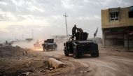  Members of the Iraqi Counter Terrorism Service (CTS) drive near the village of Bazwaya, on the eastern edges of Mosul, tightening the noose on Mosul as the offensive to retake the Islamic State group stronghold entered its third week on October 31, 2016.
