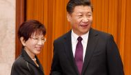 Chinese President Xi Jinping (R) shakes hands with Taiwan's opposition Kuomintang leader Hung Hsiu-chu at the Great Hall of the People in Beijing on November 1, 2016.  AFP / STR
