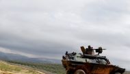 A Turkish soldier on armoured military vehicle patrols the border between Turkey and Syria, near the southeastern village of Besarslan, in Hatay province, Turkey, November 1, 2016. REUTERS/Umit Bektas

