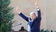 Lebanese President Michel Aoun waves to the crowd during a rally celebrating his election on November 6, 2016, at the presidential palace in Baabda. AFP / ANWAR AMRO
