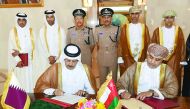 The minutes of the exchange of ratification instruments of cooperation in the field of security between Qatar and Oman being signed in Muscat yesterday.