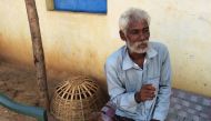 File photo of rescued bonded labourer Srikrushna Rajhansiya recalling his days in bondage outside his home in Sargul village in Odisha. (REUTERS) 