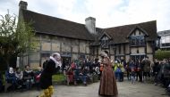 REPRESENTATIVE IMAGE: Tourists watch actors perform at the house where William Shakespeare was born in Stratford-Upon-Avon Britain April 23, 2016. REUTERS / Dylan Martinez