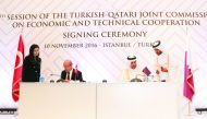 Qatar's Minister of Economy and Commerce H E Sheikh Ahmed bin Jassim Al Thani, and Turkish Deputy Prime Minister Mehmet Simsek signing the Minutes of the session.
