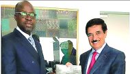 H E Dr Hamad bin Abdulaziz Al Kawari with Ivory Coast's Defence Minister Alain Richard Donwahi.