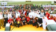 Ismail poses for a photograph with QBF and Al Rayyan Club officials. 
