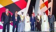 Prime Minister and Interior Minister H E Sheikh Abdullah bin Nasser bin Khalifa Al Thani and Qatar Olympic Committee (QOC) President H E Sheikh Joaan bin Hamad Al Thani with top officials after during the opening of  the 21st General Assembly Meeting of t