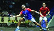Mohamed El Shorbagy of Egypt returns to Leo Au of Hong Kong during their Qatar Classic 2016  Championship at the Khalifa International Squash Complex in Doha yesterday. Pic by: Kammutty VP/The Peninsula