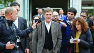 Telecom Italia Chief Executive Officer Flavio Cattaneo talks with reporters during a meeting in Rome, Italy, yesterday. Speculation that Telecom Italia may sell majority-owned TIM Participações, Brazil's second-largest wireless operator, has surfaced rece