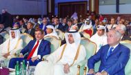 Prime Minister and Interior Minister H E Sheikh Abdullah bin Nasser bin Khalifa Al Thani, and Deputy Prime Minister and Minister of State for Cabinet Affairs H E Ahmed bin Abdullah bin Zaid Al Mahmoud at the World Policy Conference in Doha yesterday. 