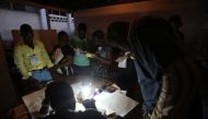 Electoral workers are seen during vote counting at a polling station as Haiti holds a long-delayed presidential election after a devastating hurricane and more than a year of political instability, in Port-au-Prince, Haiti, November 20, 2016. REUTERS/Jean