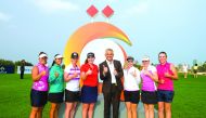 Ladies European Tour CEO Ivan Khodabakhsh poses for a photograph with LET pro's during the  Qatar Ladies Open at Doha Golf Club yesterday.
