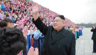 North Korean leader Kim Jong Un takes part in a photo session with the participants of the 6th Congress of the Democratic Women's Union of Korea in this undated photo released by North Korea's Korean Central News Agency (KCNA) in Pyongyang on November 22,