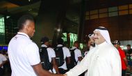 Qatar Rugby Federation's Yousef Al Kuwari receiving the Fiji team at the Hamad International Airport in Doha on Friday.