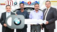 Lucky Draw winners Udayakumar Golpala Pillai (Coupon No: 0125724) and Pradeep (Coupon No: 1293391) receive car key from Safari Group Director and General Manager Zainul Abideen & Operations Manager Shahid Khan.  The Second Lucky Draw for next 2 BMW cars w