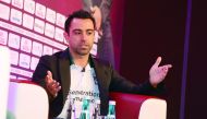 Barcelona legend Xavi Hernandez speaks during the Soccerex Asian Forum in Doha yesterday.