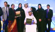Minister of Public Health and Managing Director of HMC, H E Dr Hanan Mohamed Al Kuwari, and members of some of the winning teams at the 2016 HMC Stars of Excellence Awards.
