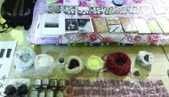 Explosive and explosive-making materials are displayed by the Rapid Action Battalion (RAB) after a raid on a banned Islamist extremist outfit, in Chittagong, yesterday.