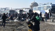 ALEPPO, SYRIA - DECEMBER 20: Civilians from East Aleppo, which was under siege by Assad regime forces and its supporter foreign terrorist groups, wait for their evacuation at Amerriye region of Aleppo, Syria on December 20, 2016. ( Mustafa Sultan - Anadol