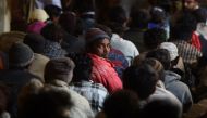 Arrested Indian fishermen wait at a police station in the Pakistani city of Karachi on February 20, 2016 (AFP Photo/Asif Hassan).