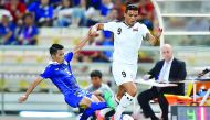 Iraqi player Ahmed Yaseen (wearing white) in action in this file photo
