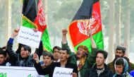 Afghan people shouts slogans and hold banners during a protest against Pakistan in front of the Pakistani Embassy in Herat, Afghanistan on January 14, 2017. Protesters accuse Pakistan government for the recent attacks in Afghanistan. (Mir Ahmad Firooz - A