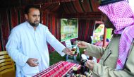 A local honey seller at Wakrah Vegetable yard. Pic: Abdul Basit/ The Peninsula