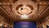 A picture taken on January 22, 2017 shows men at work to prepare the Syria peace talks conference room at Astana' Rixos President Hotel. The talks, set to begin on Monday, will be the first time a delegation composed exclusively of rebel groups will negot