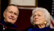 Former President George H.W. Bush (L), and former first lady Barbara Bush attend the Texas A&M University commencement ceremony in College Station, Texas, December 12, 2008. REUTERS/Larry Downing
