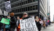 Anti-Trump demonstrators protest at abortion rights rally in Chicago Illinois January 15 2017 (REUTERS Kamil Krzaczynski) 