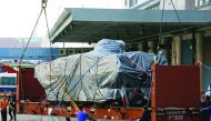 One of nine Terrex armoured vehicles waits to be loaded onto a truck at a cargo terminal in Hong Kong, yesterday.