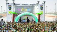 Participants in the third edition of The Color Run presented by Sahtak Awalan: Your Health First at the Qatar National Convention Centre in Doha as part of the Tropicolor World Tour.