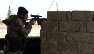 A member of Free Syrian Army attacks to Islamic State positions in al-Bab town of Aleppo as they advance to al-Bab town of Aleppo during the 