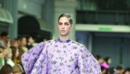 Models present creations by Mulberry during their catwalk show on the third day of the Autumn/Winter 2017 London Fashion Week at the Old Billingsgate market in London, yesterday.