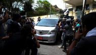 Members of the media surround a North Korea official's car as it leaves the North Korea embassy in Kuala Lumpur, Malaysia, February 22, 2017. REUTERS/Athit Perawongmetha.