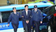 Samsung Group chief, Lee Jae-Yong arrives at the office of the independent counsel team in Seoul, yesterday.