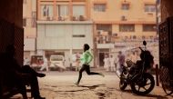 Zahra Lari runs in a scene shot for the Nike Middle East ad campaign filmed in Dubai, UAE, February 10, 2017. Picture taken February 10, 2017. Nike/Handout via REUTERS