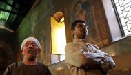 FILE PHOTO: Relatives of passangers on EgyptAir flight that went missing at sea at Saints Peter and Paul Coptic Orthodox church in Abassya district, Cairo, May  22, 2016 (EPA) 