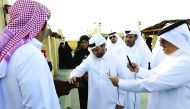 Katara General Manager Dr Khalid bin Ibrahim Al Sulaiti and other officials tour the barns, which showcase various breeds of sheep and goats, at the opening of sixth Halal Qatar Festival at Katara.