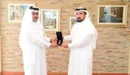 Lt General Saif Abdullah Al Sha’far awarding the medal to Ibrahim Mubarak Abdulrahman.