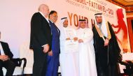 Hamad Medical Corporation officials receiving the award.