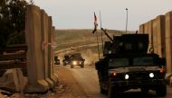 Iraqis forces advance as they battle with Islamic State militants, in western Mosul, Iraq March 11, 2017. REUTERS/Suhaib Salem
