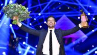 Swedish singer Robin Bengtsson celebrates winning the finale in the Swedish song contest 'Melodifestivalen' with the entry 'I Can't Go On' at the Friends Arena in Stockholm, on March 11, 2017.
Bengtsson' song 'I Can't Go On' will represent Sweden in the 
