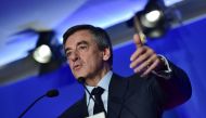 French presidential election candidate for the right-wing Les Republicains (LR) party Francois Fillon speaks during a press conference on his programme on March 13, 2017 at his campaign headquarters in Paris. / AFP / CHRISTOPHE ARCHAMBAULT
