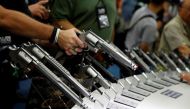 File photo of attendees visiting the trade booths during the National Rifle Association's annual meeting in Louisville, Kentucky. Reuters 